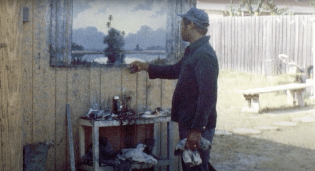 Harold Newton painting in his backyard